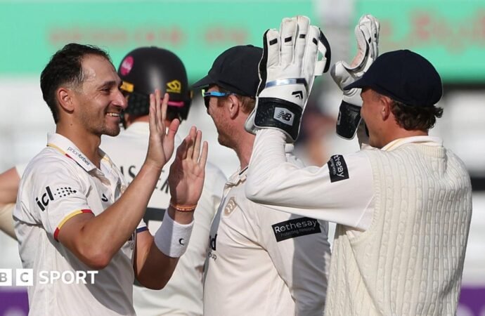 County Championship: Surrey bowled out for 183 by Essex at Chelmsford