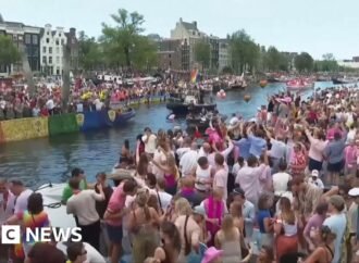 Crowds line Amsterdam’s canals for Pride boat parade