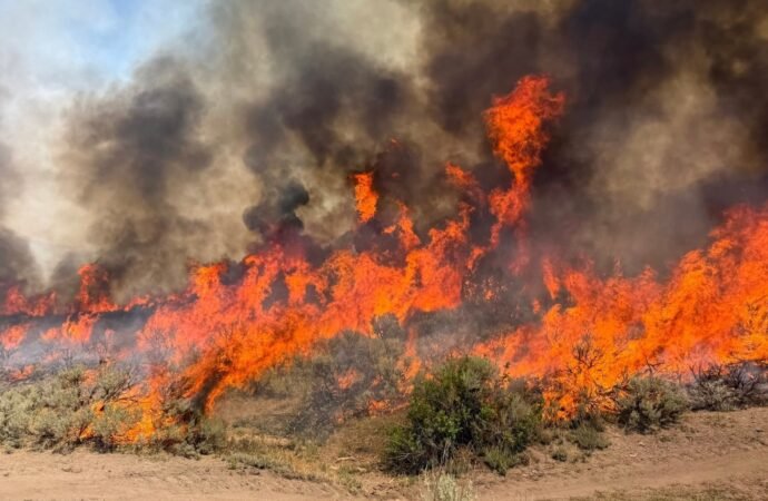 Dangerous wildfire keeps crews from reaching helicopter crash in Utah