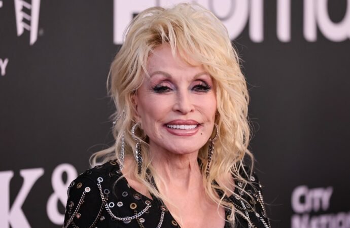 Dolly Parton Skips Dollywood Ride Opening Amid Ongoing Health Problems: ‘My Nashville Doctor Has Kinda Clipped My Wings’