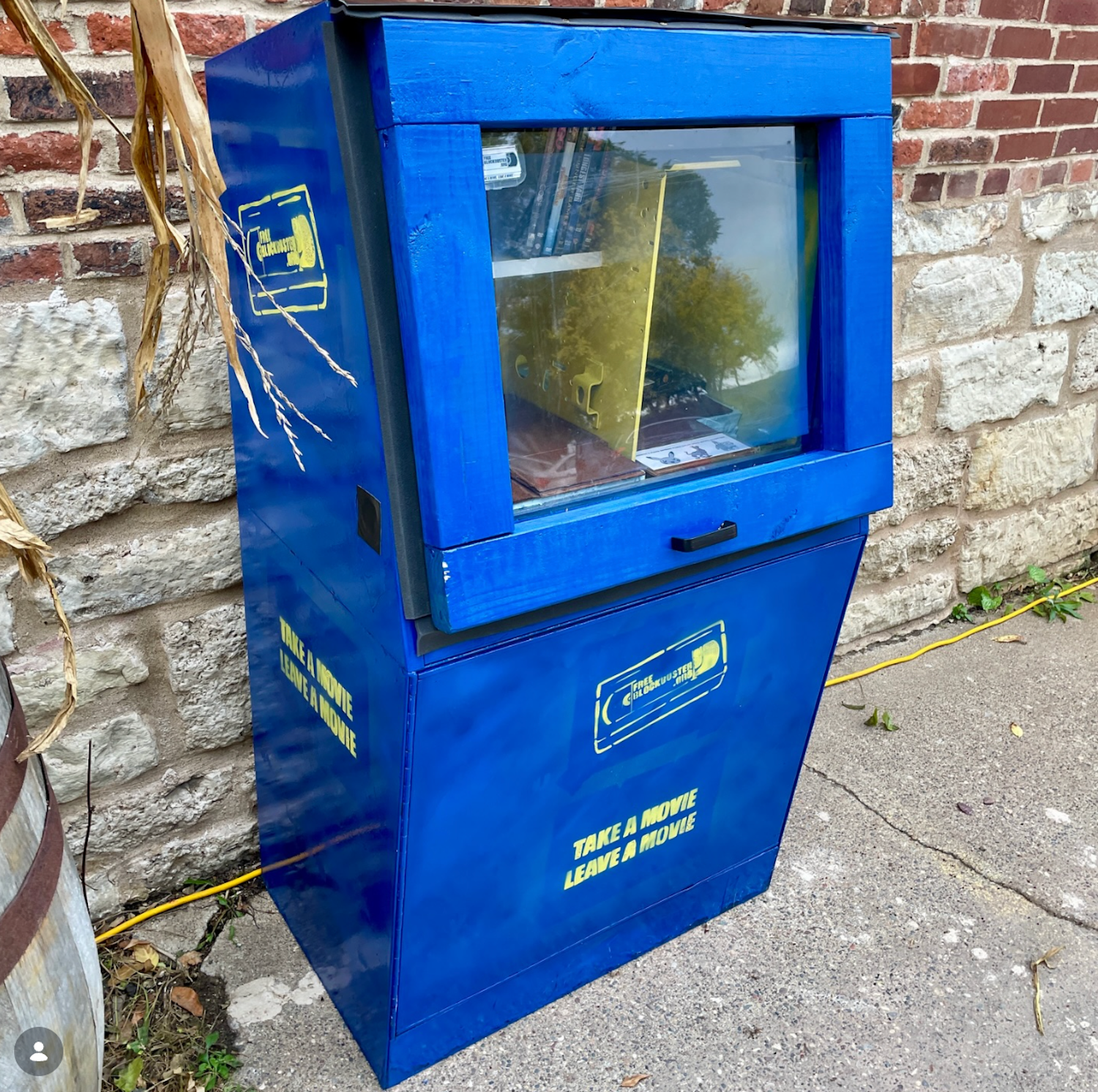 Free Blockbuster stand made from old newspaper dispenser