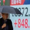 Global shares mostly rise after buying of AI-related shares and oil prices fall