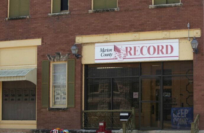 Kansas town will pay $850K to end reporter’s lawsuit over 2023
