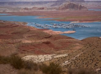 Lake Powell hits record low, threatening key water and electricity supply for millions