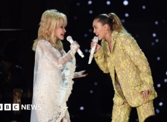 Miley Cyrus remembers godmother Dolly Parton as an ‘angel by my side’