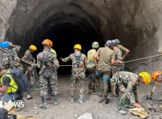 Nepal rescuers blast hillside in search of hydropower workers as families wait anxiously