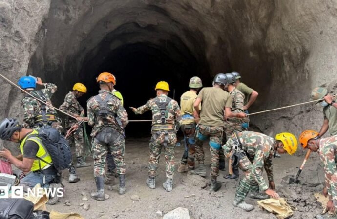 Nepal rescuers blast hillside in search of hydropower workers as families wait anxiously