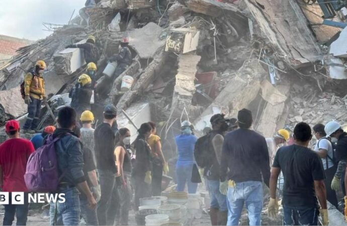 Rescuers scramble for survivors with 180 dead in Colombia earthquake