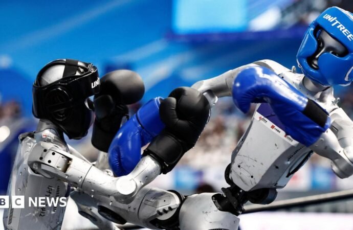 Robots compete in boxing, football and sprinting at World Humanoid Games