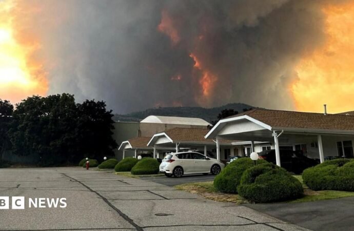 ‘Total incinerated destruction’: Canada wildfire evacuees wonder if they still have homes