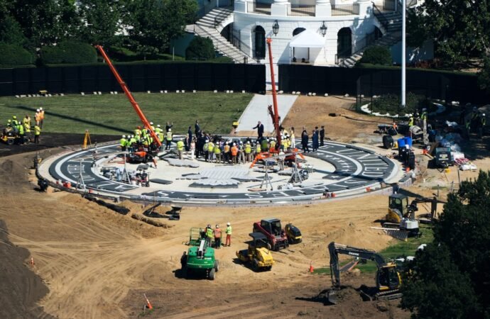 Trump plays White House tour guide to show off work on his helipad and ballroom