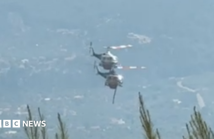 Two crew killed as British pilot survives after firefighting helicopters collide in Greece