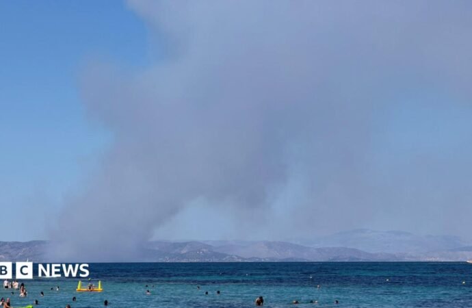 Two dead and hundreds evacuated as wildfires break out near Athens