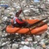 Watch: Manila river surface covered in tide of rubbish