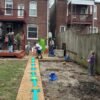 We skipped the expensive birthday venue. Our muddy backyard was better for 90 kids.