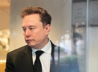 Why the richest man on Earth wants you to think money won’t matter