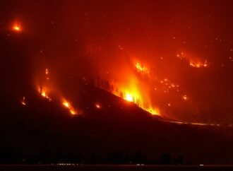 Wildfires burn across western US and Canada as residents are evacuated