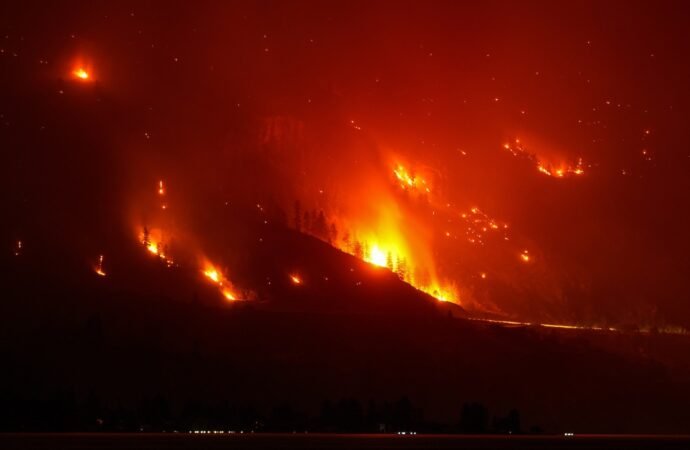 Wildfires burn across western US and Canada as residents are evacuated