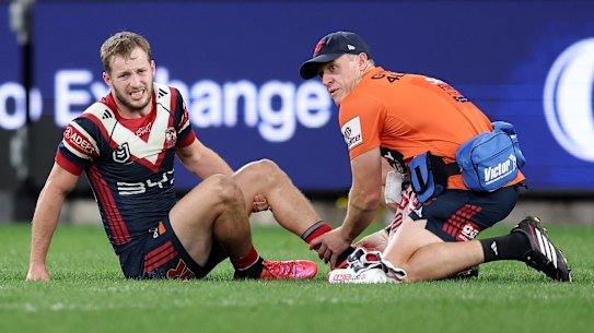 Sam Walker goes down injured in the Roosters loss to the Dolphins.
