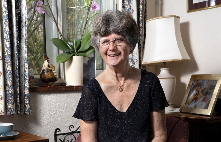 Portrait of Sarah Herbert seated in home setting.