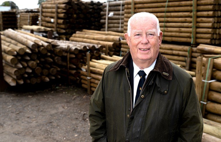 Portrait of Anthony Bravery in a woodyard setting.
