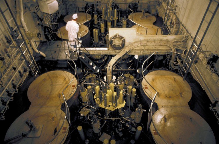 Overhead view of an engineer monitoring a nuclear reactor in the inside of an Arctic icebreaker.
