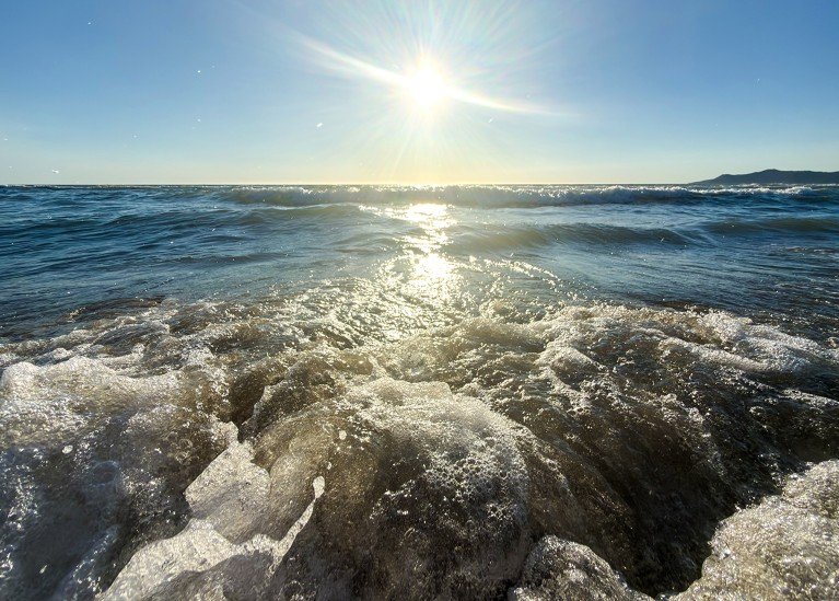 The sun shines over the Adriatic coast as temperatures reach 36°C in Lalzi Bay, Albania.