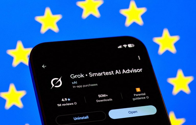 A smartphone displaying the page for Grok in an app store. Behind the phone is a blurreed European Union flag.