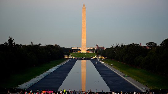 The Reflecting Pool is supposed to be a solemn place for visitors between the Washington Monument and Lincoln Memorial.