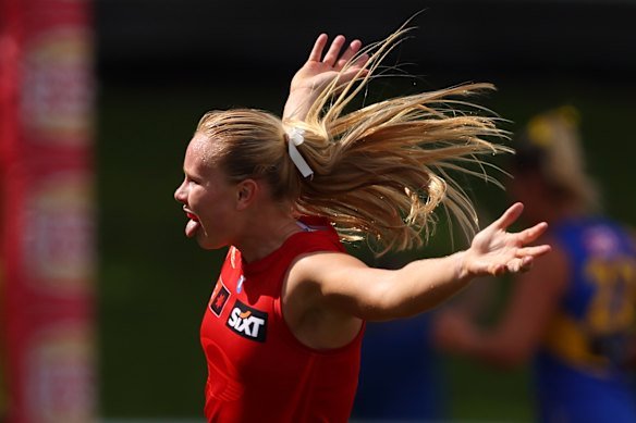 Alannah Welsh of the Suns celebrates a goal.