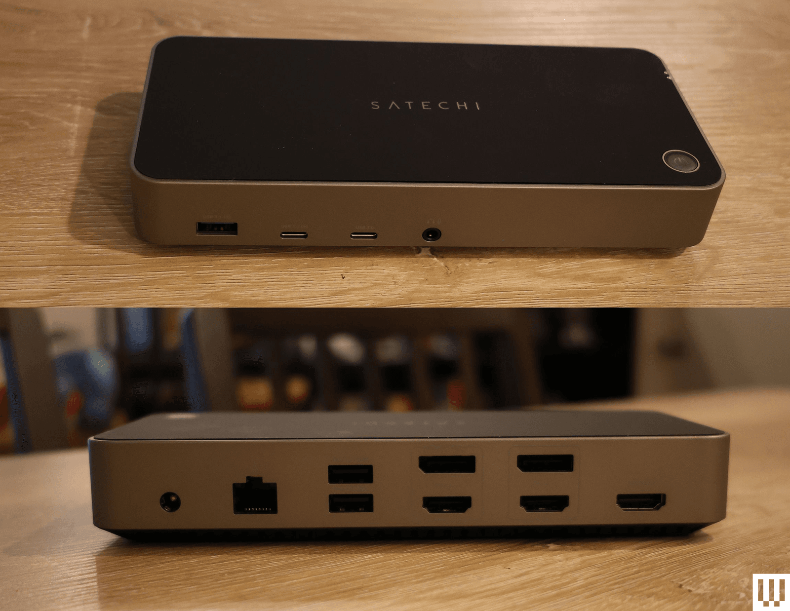 Front and back view of black rectangular device with multiple ports