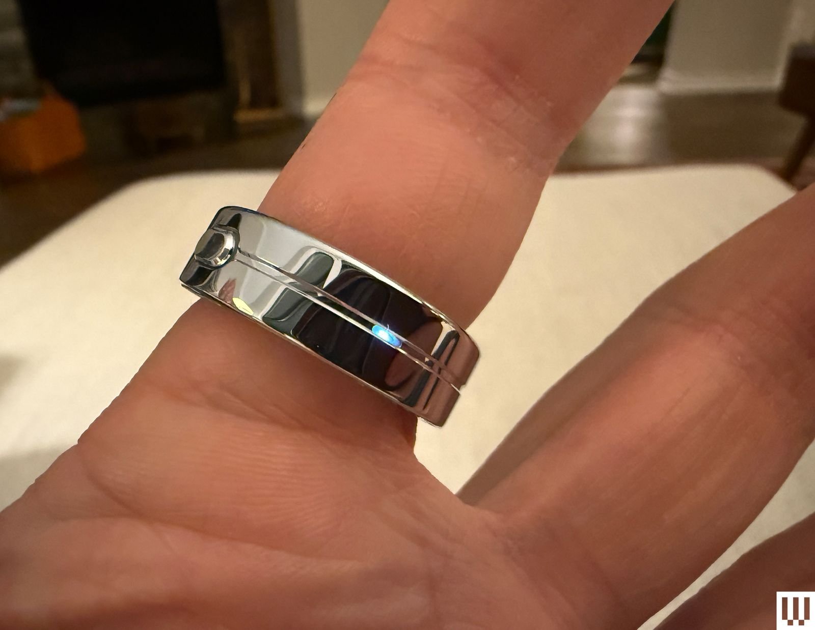 Image may contain Accessories Jewelry Ring Silver Bottle Cosmetics and Perfume