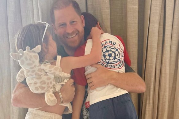 An image posted on Instagram by Meghan shows Harry being hugged by their children on Father’s Day. 