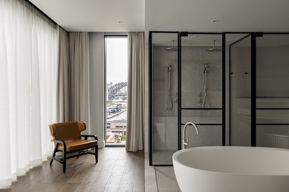 Capella Sydney’s Liberty Suite, offers partial views of the Sydney Harbour Bridge.