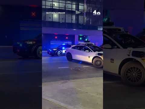 Waymo car blocks traffic during Austin mass shooting | NBC New York thumbnail