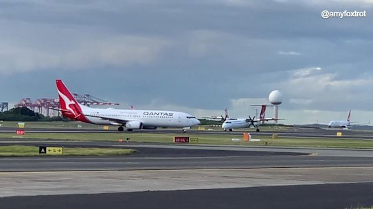 The Boeing 737 (left) and the Bombardier DCH-8 involved in a breakdown of coordination at Sydney Airport now under investigation.