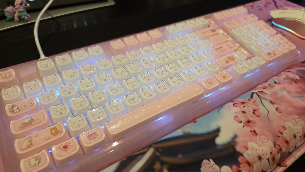 The kitty keycaps have a jelly-like look to them, and even though the whole keyboard is plastic, it looks really high quality.