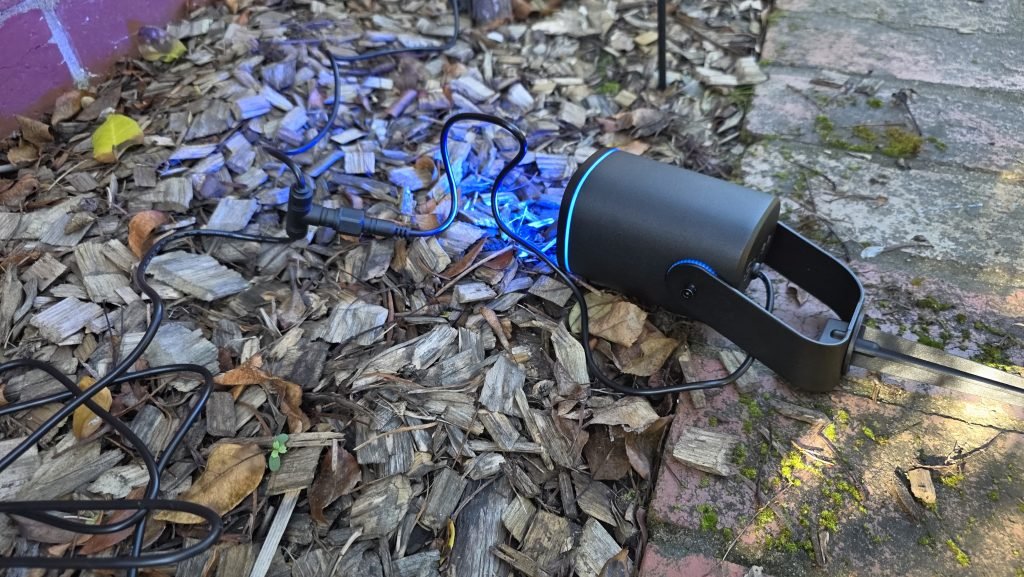 Light connected and turned on, but not yet properly placed in the garden.