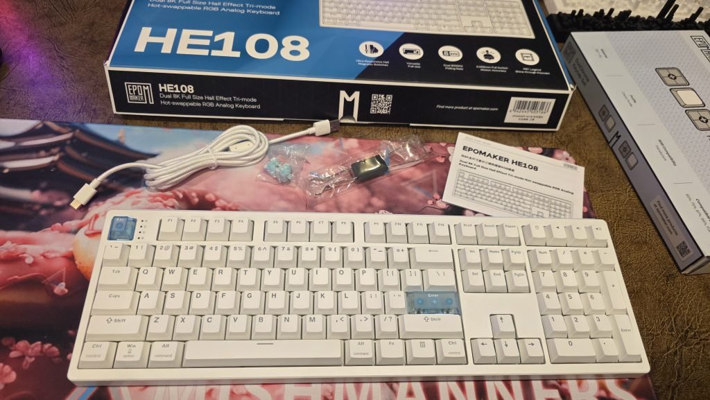 The Unboxing shows all the things that come with the keyboard including keyboard, keycap puller, extra switches, and USB cable.