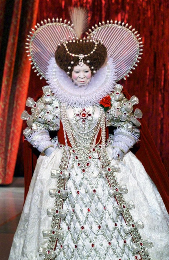 Host Whoopi Goldberg appears as Queen Elizabeth, in a Bob Mackie costume, during the 71st Annual Academy Awards in Los Angeles on March 21, 1999.