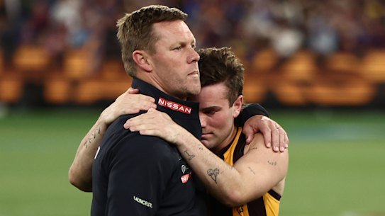 Hawthorn coach Sam Mitchell and gutted superstar Nick Watson after an MCG classic to remember.