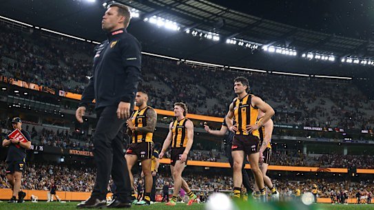 Sam Mitchell and his Hawks leave the field.