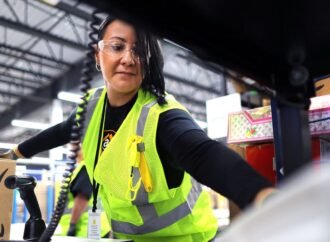 Amazon is upping its minimum hourly wage for operations workers — and offering employees a new Whole Foods discount