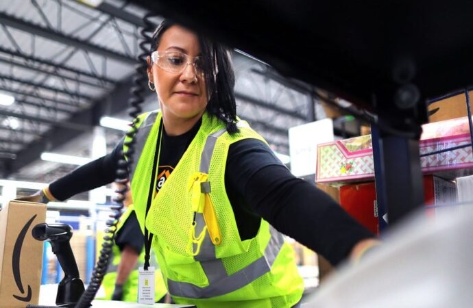 Amazon is upping its minimum hourly wage for operations workers — and offering employees a new Whole Foods discount