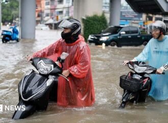 Bangkok roads submerged as flood disaster declared