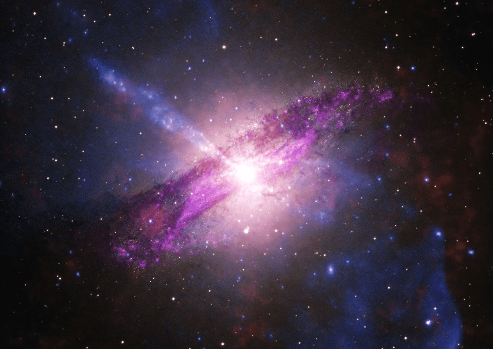 A giant elliptical galaxy undergoing a dusty merger, featuring a powerful jet of particles blasting tens of thousands of light-years into space. Chandra’s X-rays (blue) showcase the high-energy jet, with additional X-rays from IXPE (orange), while Webb infrared (magenta) and optical light (amber and white) from the European Southern Observatory expose a dark, churning dust lane. As one of the closest active galaxies to Earth, Cen A allows astronomers to study the effects of supermassive black hole jets in extraordinary detail. Image: X-ray: (Chandra) NASA/CXC/SAO, X-ray (IXPE): NASA/MSFC; Optical: ESO; Infrared: NASA/ESA/CSA/STScI; Image Processing: NASA/CXC/SAO/L. Frattare, K. Arcand, and J. Major.