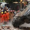 Dozens feared trapped in collapsed building in Delhi