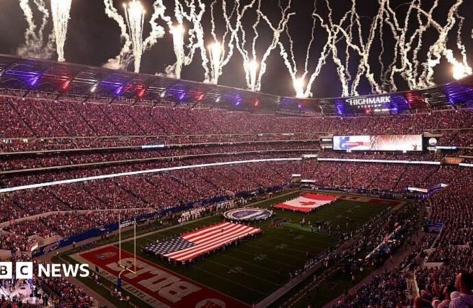 In a border city stadium, US NFL fans sing Canada anthem with gusto