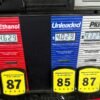 Inflation cooled slightly last month even as consumers stepped up spending