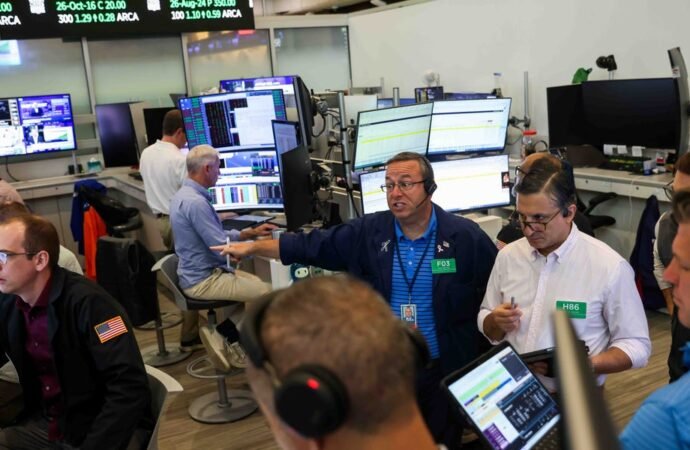 Investors cheer falling bond yields after a top Fed official eases rate-hike worries